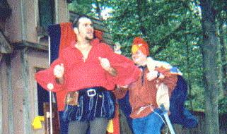 It's the hat!  Chicks dig him!